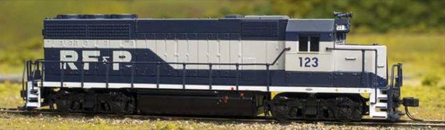 Photo of N scale model GP40 locomotive in blue and gray paint with block letter scheme